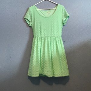 Blue lace, knee length dress.